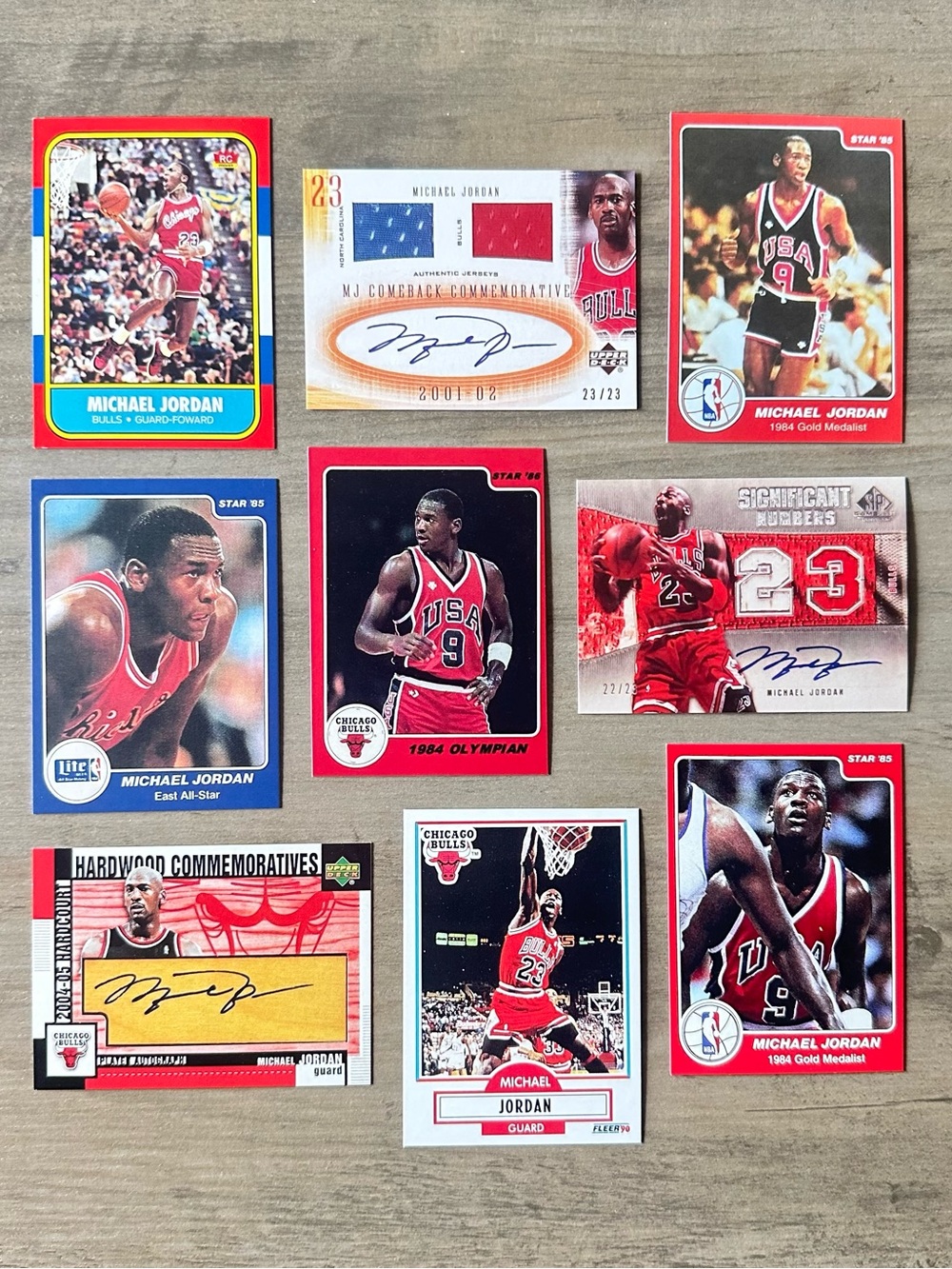 Michael Jordan Signed Rookie Lot of (9) Star Upper Deck Fleer Novelty Cards.